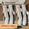 Women Socks 2 Pairs Magnetic Ins Fashion Hands In Hand Couple Club Celebrity Funny Creative Attraction Cartoon Eyes