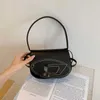 Abendtaschen Dang Bag Frühling neue Umhängetasche Persönlichkeit coole Mode Handtasche Mode Unterarmtasche weibliche Luxusmarke berühmte Designer alle Umhängetasche YQ240130