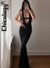 Casual Dresses Chicology Hollow Out Sexy V-Ausschnitt Rückenfreies, figurbetontes schwarzes langes Kleid Party Abend Elegantes Festival Frauen Kleidung für den Großhandel