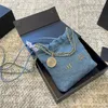 Klassieke Camellia vuilniszak mode dames mini-schoudertas 18 cm denim gouden hardware metalen sluiting luxe draagtas munt gematelasseerde ketting crossbody tas make-up tas portemonnee