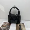 Mini borse metallizzate Borsa a tracolla da donna Borsa a tracolla in argento oro distintivo Borsa quadrata versatile piccola portatile Decorazione con fiocco di alta qualità