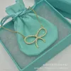 Tiffanyjewelry Kadınlar İçin Altın Kolye Tasarımcısı Mücevher Mücevherleri S925 STERLING Gümüş Yay Damgalı Elmas Kolye Şık ve Minimalist Köşeli Kücon Zinciri