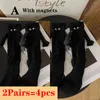 Women Socks 2 Pairs Magnetic Ins Fashion Hands In Hand Couple Club Celebrity Funny Creative Attraction Cartoon Eyes