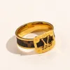 Anillo de lujo Joyería Anillos de diseñador Mujeres Amor Anillo Encantos Negro Blanco 18K Chapado en oro Anillo de dedo fino