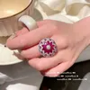 クラスターリングファッションlxuury 925スターリングシルバージュエリー輝くaaaaa cubic zirconiaウェディングエンゲージメントフラワーエクソトレンディ