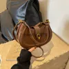 Sacs à bandoulière Sac de selle semi-circulaire sous les bras pour femmes, haut de gamme et design de niche, sac à bandoulière tendance pour femmes, nouveau printemps 2024, sac à bandoulière simple, H2422