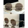 Hommes et femmes Designer Premium Sens CH Lunettes de soleil de vacances rondes Vintage Premium Sens C Collier en cuir en métal pour femmes Protection UV Lunettes de soleil de voyage