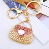 Keychains 2024 Fashion Pearl Bag Form Flower Rhinestone Crystal Keychain for Women's Bags Hängen Decoration Keyrings Smycken