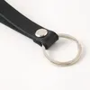 Keychains Leather Keychain Retro enkel nyckelkedja för män och kvinnor exklusiva bilhandgjorda riktiga hängen K2462
