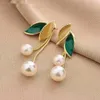 Stud Neuem Modetrend einzigartiges Design Elegant Delicate Light Luxury Pearl Leaf Quaste Ohrringe Frauen Schmuckparty Premium Geschenke {Kategorie}