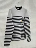 Damskie swetry designerski sweter wiosna 24 czarno -białe paski kreskówkowe haftowane okrągły szyję z długim rękawem Sweter VT06