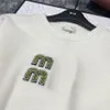 Designer tröja Cardigan Spring Loose Casual Knitwear Round Neck White Heavy Industry Soft Top Green Bead Letter Brodery