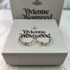 Bijoux de luxe de créateur VivienenWestwoods Satellite Viviane Westwood Impératrice douairière Petite Saturne Grand Cercle Boucles d'oreilles Célébrité Internet Personnalité exagérée