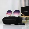 2024 Frameless large frame female sunglasses printed Xiaoxiang new glasses