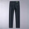 Paa designer de luxo primavera verão calças jeans masculinas calças de negócios calças casuais marca moda cor sólida leggings preto