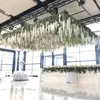 装飾的な花12枚の模倣ウィステリアスミレの結婚式の装飾のための天井プラスチックバイン人工パーティー