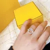 Bagues de diamant de luxe Designer pour femmes Bijoux de luxe Argent F Anneaux Femmes Bague en or Bague d'amour Sparkling Cadeaux de fiançailles de mariage Finger Sizer