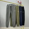 Calças masculinas 2024 inverno engrossado dupla face polar velo cor sólida calças casuais ao ar livre sweatpants frio quente