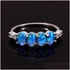 Anneaux de mariage Trendy Blue Fire Opal Bague de fiançailles Single Row Petite pierre ovale Vintage Sier Couleur pour femmes Boho Jewelrywedding Drop Dhvbc