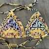 Trend everything casual beach beach wind bikini two-piece set of new trend geometric cherry blossom design summer sexy beauty strap strap top swimming movement