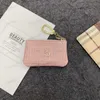 2024 Nouvelle bourse clé Scheche femme hommes Box Box Cuir Zipper Luxury Lady Business Card Portefeuille Designer portefeuille Coin Coss Cartes Hautelle de haute qualité Small Wallet