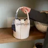 Bolsas de ombro Bolsa balde de mão tecida de alta qualidade para bolsa feminina tendência 2023 nova bolsa crossbody minimalista e de ombro únicoH2422