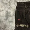 メンズジーンズJNCO Y2Kヒップホップレトログラフィック刺繍バギーブラックパンツ男性女性ハラジュクゴシックハイウエストワイドズボン