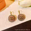 Designer channel Minimalist coffee colored round letter earrings temperament earrings high-end earrings