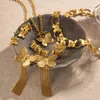 ネックレスイヤリングセットステンレス鋼18kゴールド装飾蝶のシリーズドバイメッキ2024女性チェーンとリング