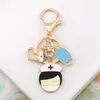 Keychains Mooie Big White Medical Angel Key Chain Nurse Doctor Mask Aid Personeelsring Spuit Stethoscoop Hanger