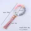 10pc créatif en bois coloré en silicone Perle Keychain Chaîne de homard PU Le cuir Pi-Tassel Keychain Bracelet Femme Bijoux de couverture 240125