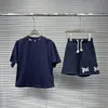 Fasion niño diseñador conjunto niños dos piezas ropa bebé camiseta verano Tops marca de lujo pantalones cortos manga con letras 100-160