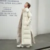 Płaszcze damskie okopy 2024 Zimowa bawełniana kurtka długa jesienna wyściełana płaszcz Kobieta nad kolanami z kapturem ciepłe kurtki