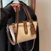 Sacs à bandoulière Le petit sac populaire de cette année pour les femmes au printemps est polyvalent.Sac à bandoulière à bandoulière unique de couleur contrastée, seau portable, nouvelle collection 2024, H2422