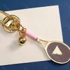 Designer Key Chain Fashion Tennis Racket Keychains Luxury Gold Ball Pendant Keychain Jewelry Gifts Lanyards för nyckelbilälskare Bag 4 Färger Tillbehör Hot -3