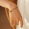 Perla intarsiata in acciaio inossidabile 18 carati di celebrità europea di Internet con ornamento per braccialetto con goccia d'acqua in lapislazzuli Commercio all'ingrosso