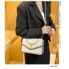 Женская новая и роскошная универсальная маленькая квадратная сумка через плечо на одно плечо с цепочкой Fragrant Wind Lingge 2024. Скидка 78% в магазине оптом.