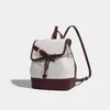 Bolsos de estilo mochila para mujeres Diseñador de lujo andbag y bolso 2023 Nuevo en viaje simple casual Colores contrastantes Cubo con cordónH2422