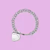 T Designer ciondolo a cuore Collana bracciale orecchini a bottone Donna Gioielli di marca di lusso Moda classica Argento sterling 925 oro rosa placcato oro 18 carati 0245494318