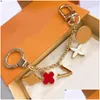 Mode Nyckelhållare Keychain Car Luxurys Designers Flower Keyring Bag Charm Lovers Gift 2211103Z Drop Delivery DH20G