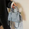 Bolsas crossbody versáteis femininas populares e de nicho deste ano, bolsas capazes 2024 78% de desconto no atacado da loja