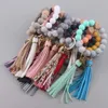 10pc créatif en bois coloré en silicone Perle Keychain Chaîne de homard PU Le cuir Pi-Tassel Keychain Bracelet Femme Bijoux de couverture 240125