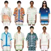 Chemise en soie 24SS Casablancas Unisexe Style de vacances Chemise en sergé blanc en soie Nouveaux hommes et femmes Designer Fashion Tops Chemises de plage Hawaii