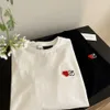 Maglietta designer loewee top di alta qualità da uomo t-shirt annuale anno nuovo maglietta limitata in stile rosso piccolo cuore unisex stile unisex