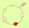 Rose Gold Ladies Boucles d'oreilles Lucky Flower Spring Bracelet Collier Fashion Charm Bijoux de luxe Tempérament haut de gamme Bijoux haut de gamme.1920610