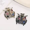 Brosches Creative Cartoon Rhinestone Seven Star Ladybug Universal Brosch Eloy Drop Oil Beetle For Men and Women's Clothing Matching Pins