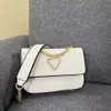 G Nova bolsa quadrada pequena com emenda de corrente minimalista impressa em cor sólida, bolsa feminina crossbody de ombro único 2024 78% de desconto no atacado da loja