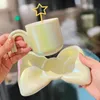 Criativo cerâmica copo de leite bonito bowknot forma sobremesa placa pérola gradiente arco-íris lidar com caneca de café estrela colher casa chá conjunto 240130