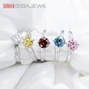 Küme halkaları gigajewe moissanite1.0ct 6.5mm novacolor vvs1 yuvarlak kesim elmas testi geçti 18k altın kaplama 925 gümüş yüzük mücevher kızı