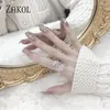 Anneaux de mariage Zakol coréen mode plume blanche doigt pour femmes à la mode cubique zircone fiançailles bijoux de fête